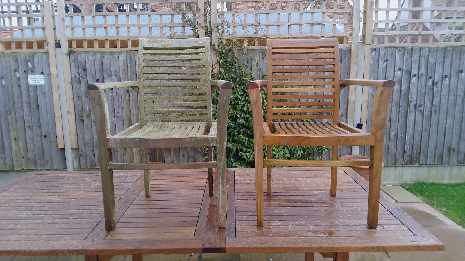 Two teak garden chairs, one cleaned and restored, one untouched